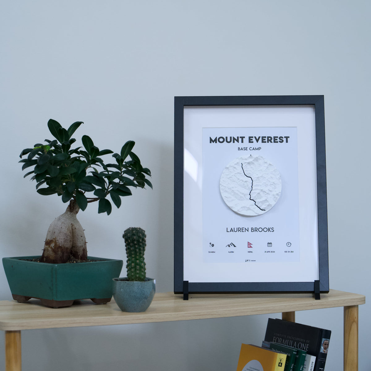 3D-printed framed adventure map — black frame, white tile